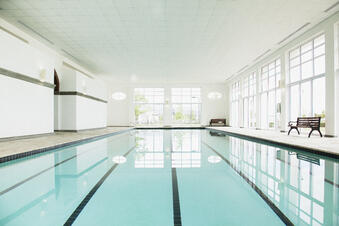 Use of a dehumidifier for indoor pools